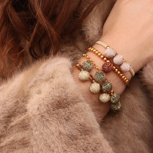 Festliche Armb&auml;nder mit neuen glitzernden Pompoms