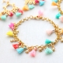 Trendy Schmuck mit Mini Quasten, DQ Metall Anh&auml;ngern und Karabiner Verschl&uuml;sse