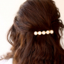 Machen Sie mit Kauri Muscheln farbenfrohen Schmuck und so tragen Sie Sommer Haaraccessoires: