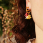 Gestalten Sie trendigen Schmuck mit den bunten Ocean Bamboo Perlen und Edelstahl-Schmuckteilen