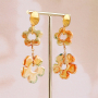 Schmuckdesigns mit griechische Blumenperlen aus DQ-Keramik
