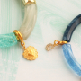 Verschiedene Armbanddesigns mit diversen Tube-Acrylperlen