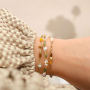 So wird aus ovalen Glasperlen mit goldfarbenem Rand schicker Schmuck 