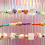 Mit Perlmuttperlen kreativ Schmuck designen