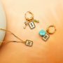 Inspirierende Schmuckdesigns mit Edelstahl-Perlmuttanh&auml;ngern mit Initiale 