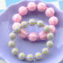 Farbenfrohen Schmuck mit gestreiften DQ-Acrylperlen gestalten