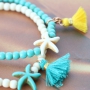 Voor een zomerse look zijn onze kraaltjes van keramiek helemaal leuk! 